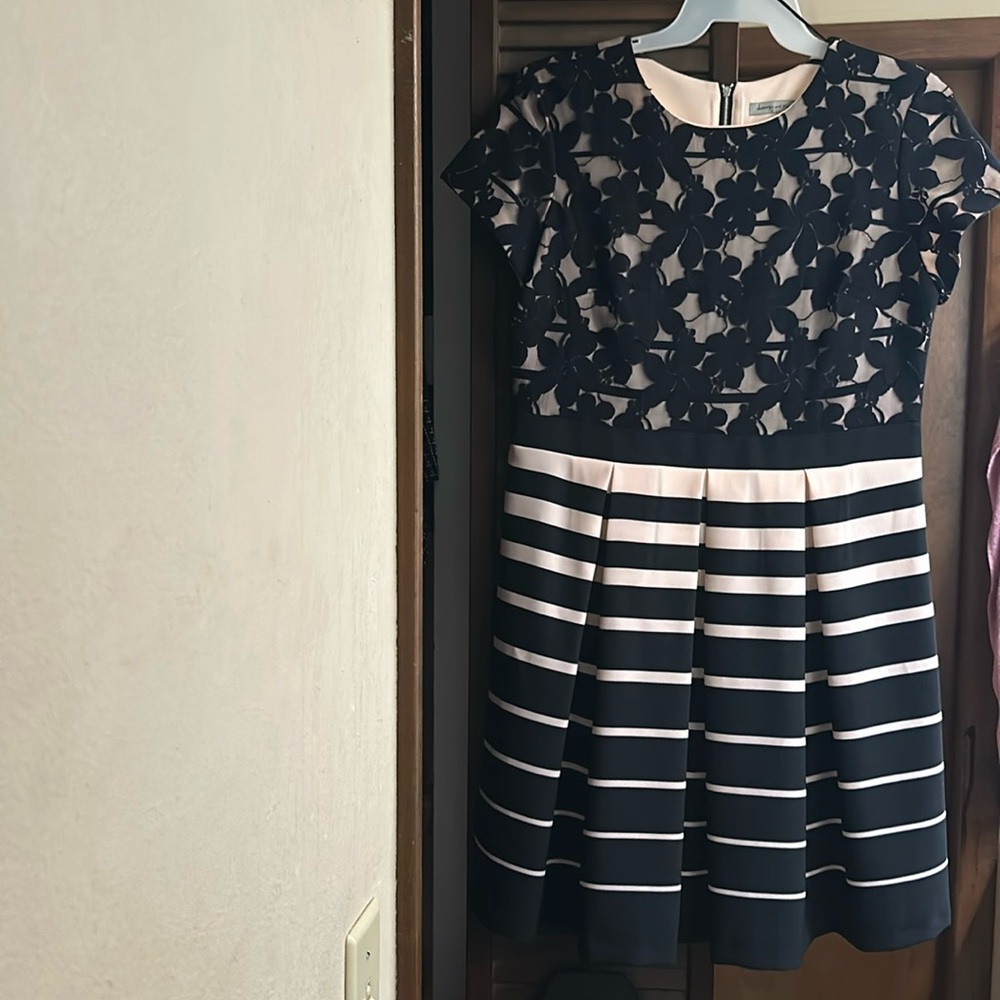 Brand new never worn pleated cream and black dress